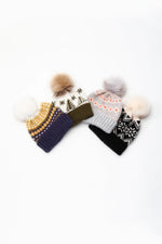 Load image into Gallery viewer, Hand Knit Happy Holiday Pom Pom Hat in Midnight
